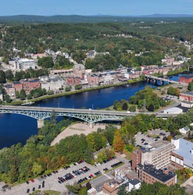 Aerial view of downtown Augusta, Maine, with the Kennebec River and the Memorial Bridge