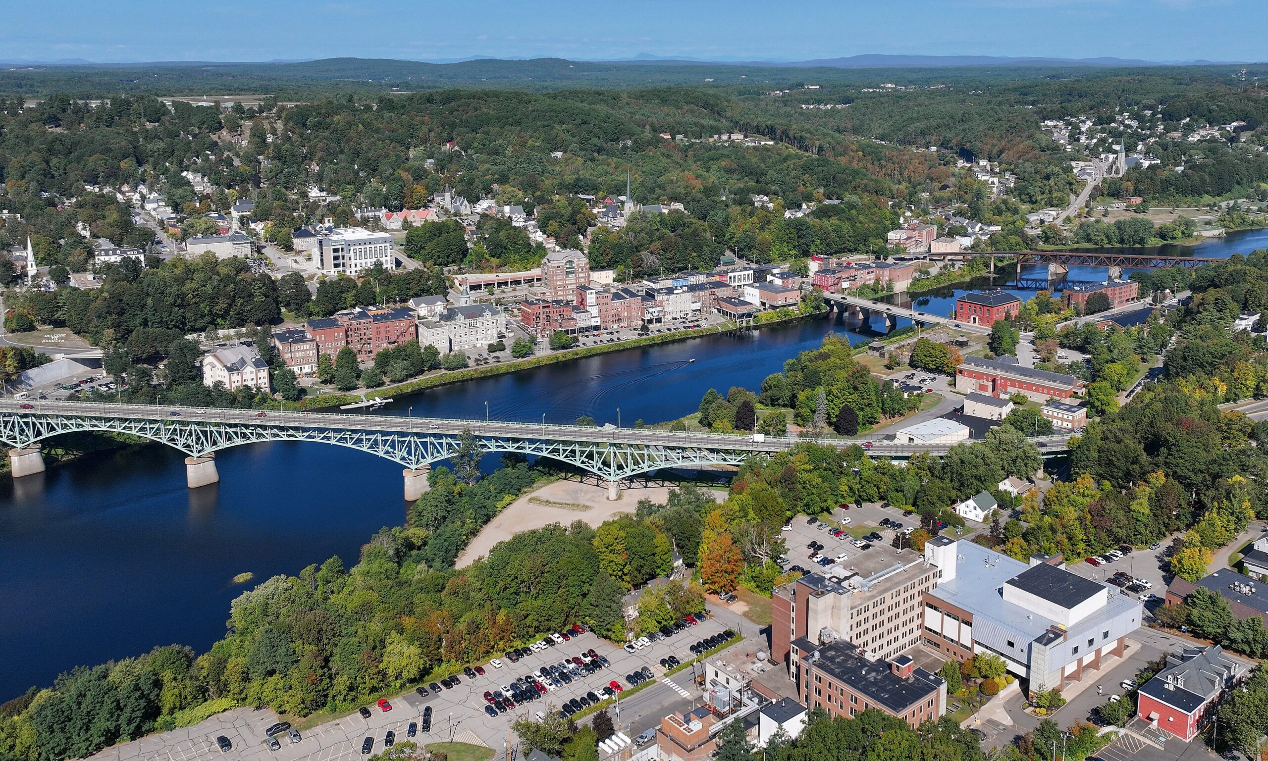 Aerial view of downtown Augusta, Maine, with the Kennebec River and the Memorial Bridge